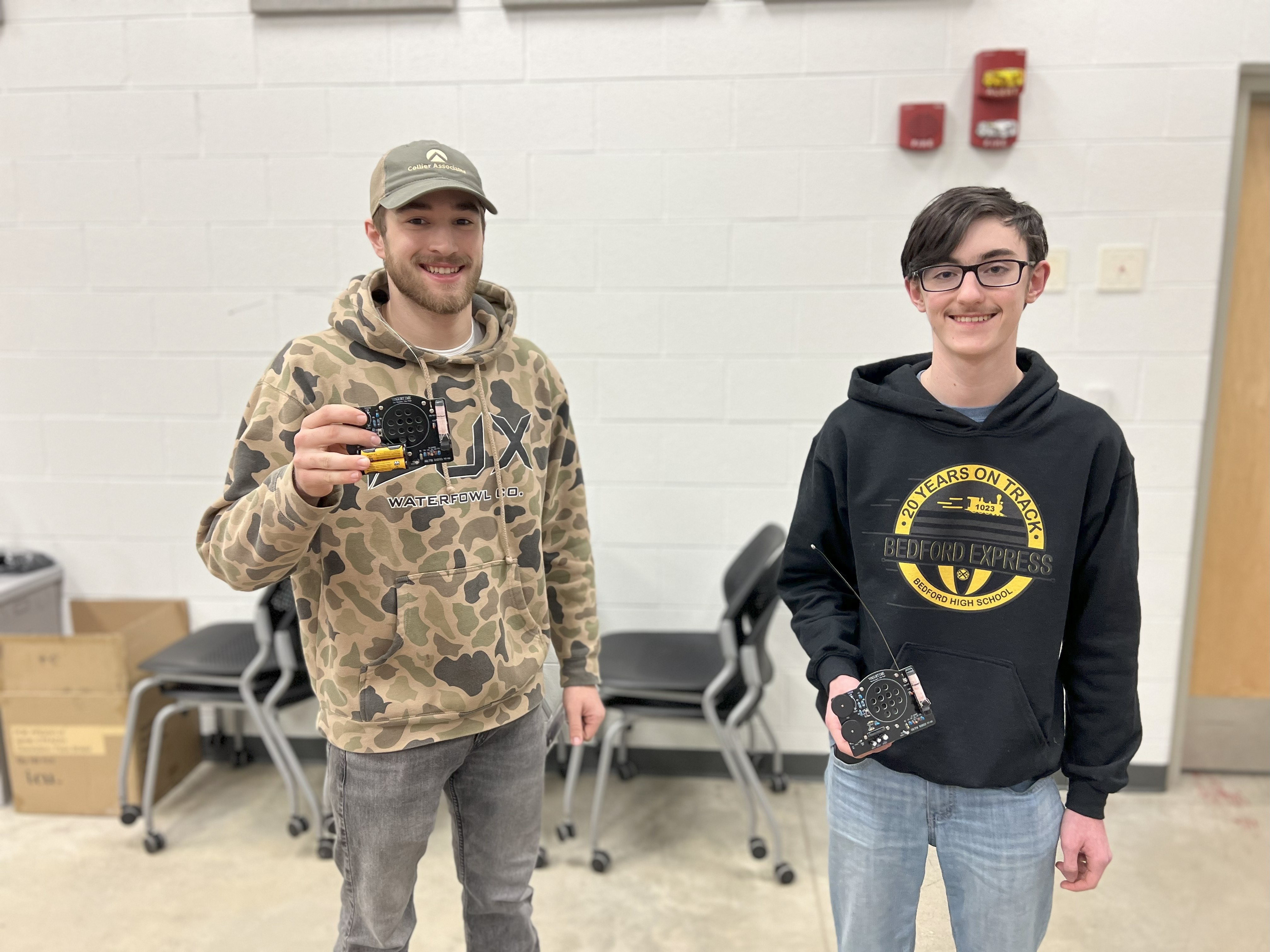 Students with printed projects