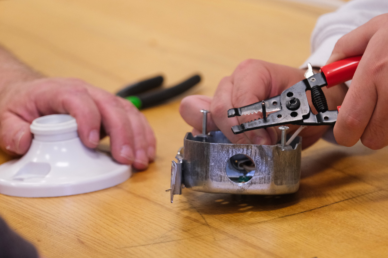 Student Working on Electrical wire