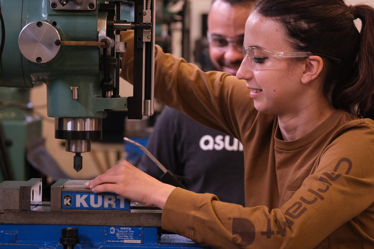 Student Working with a machine tool