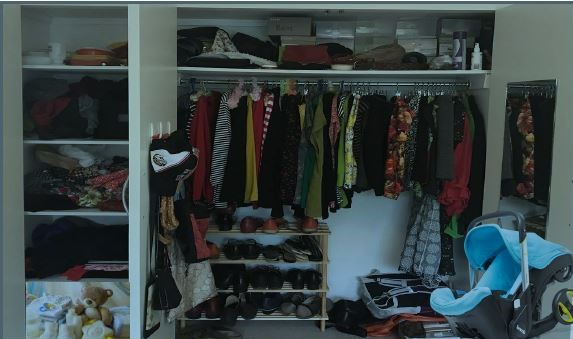 Closet filled with clothes