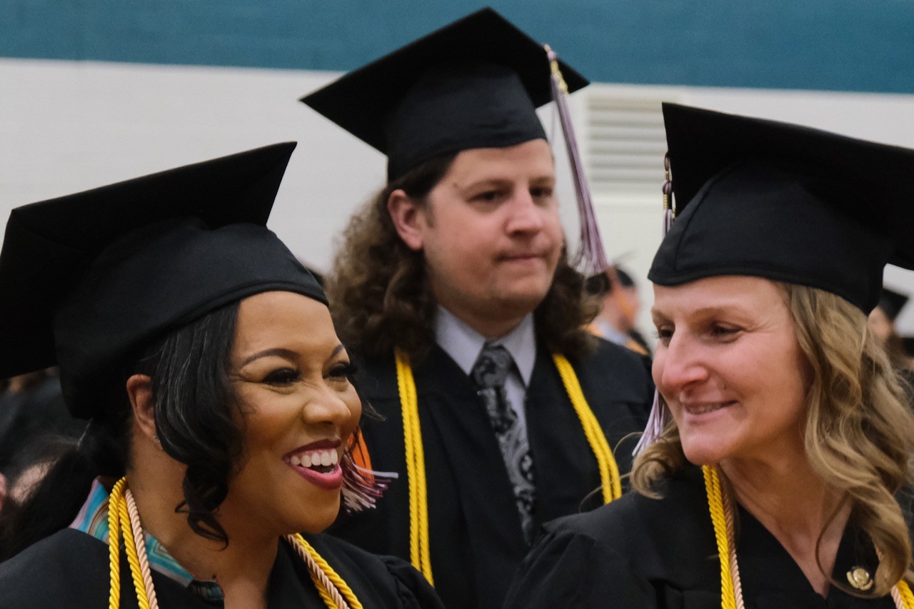 Three students at graduation