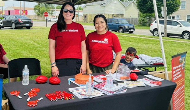 Employees working at a event booth