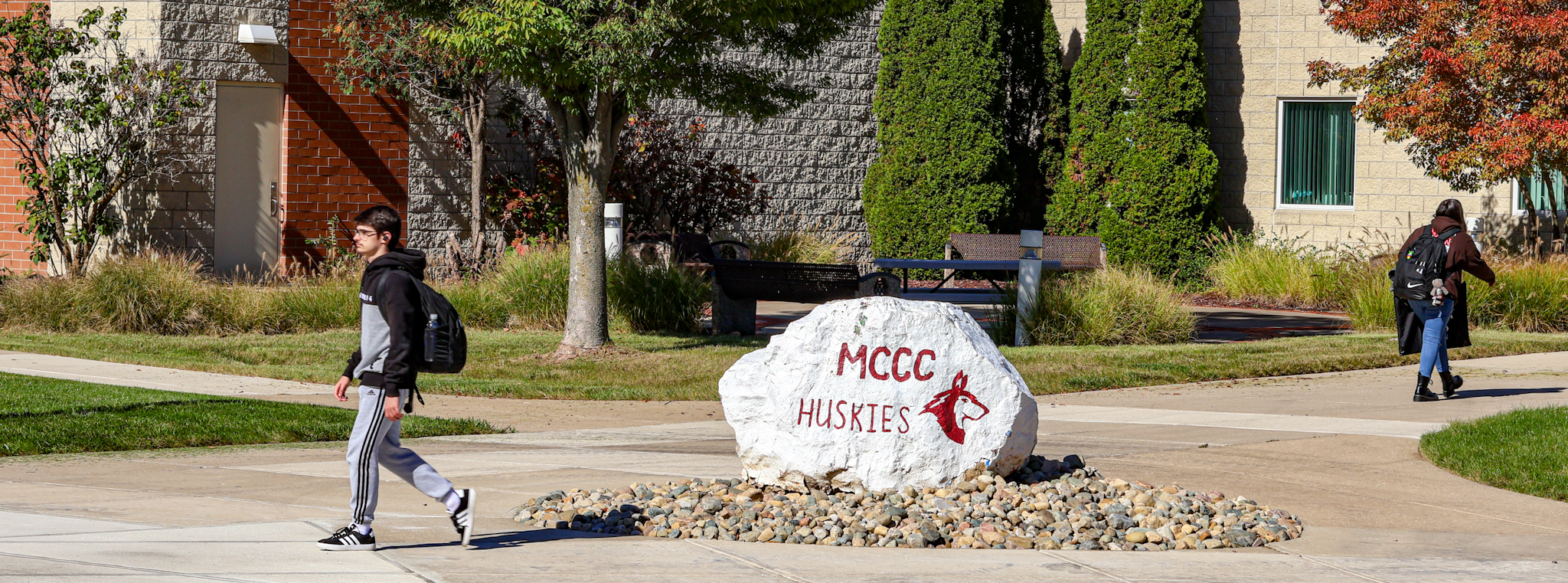 Students walking outside on campus