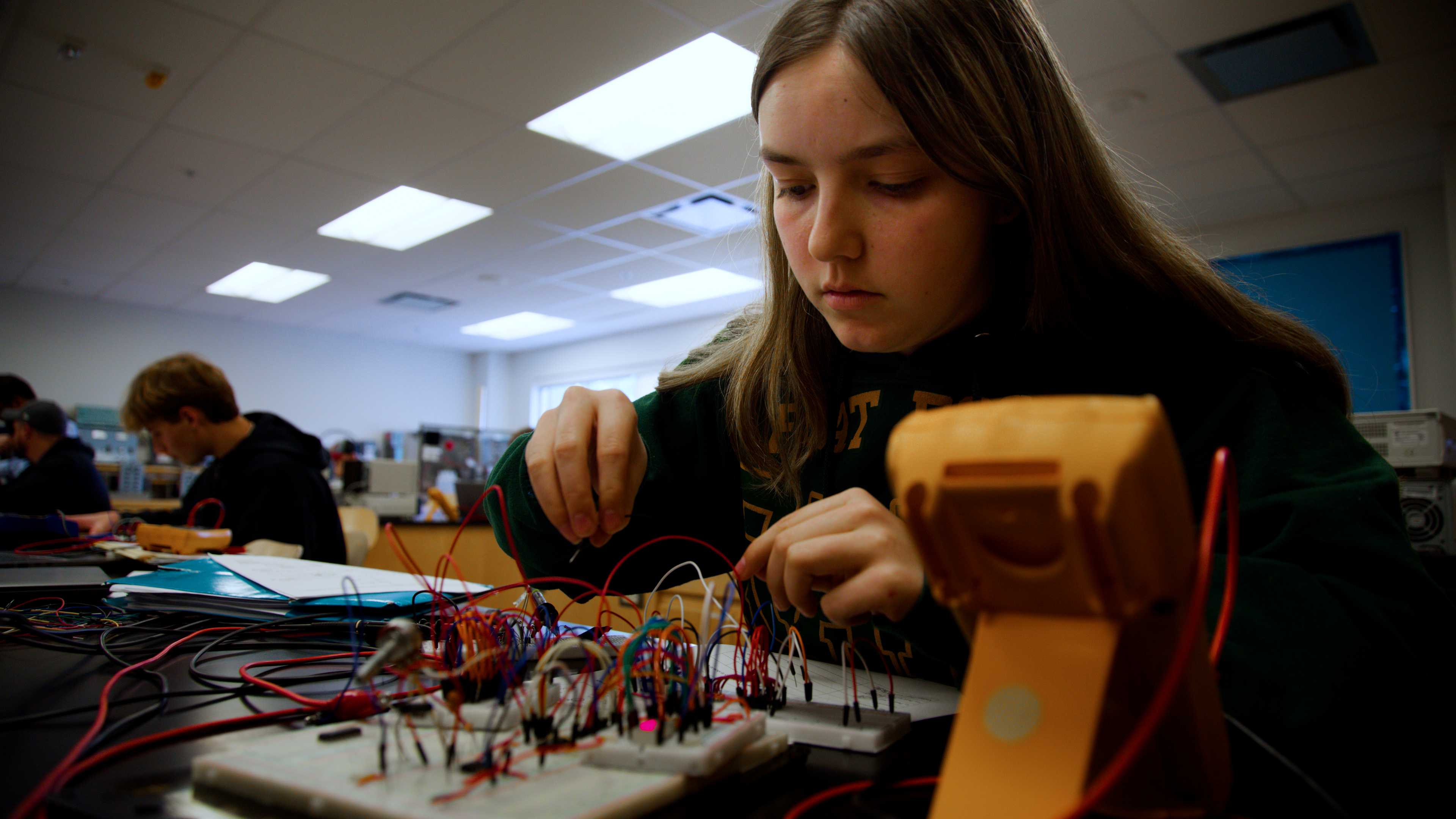 Grace Sturgeon working in electronics lab