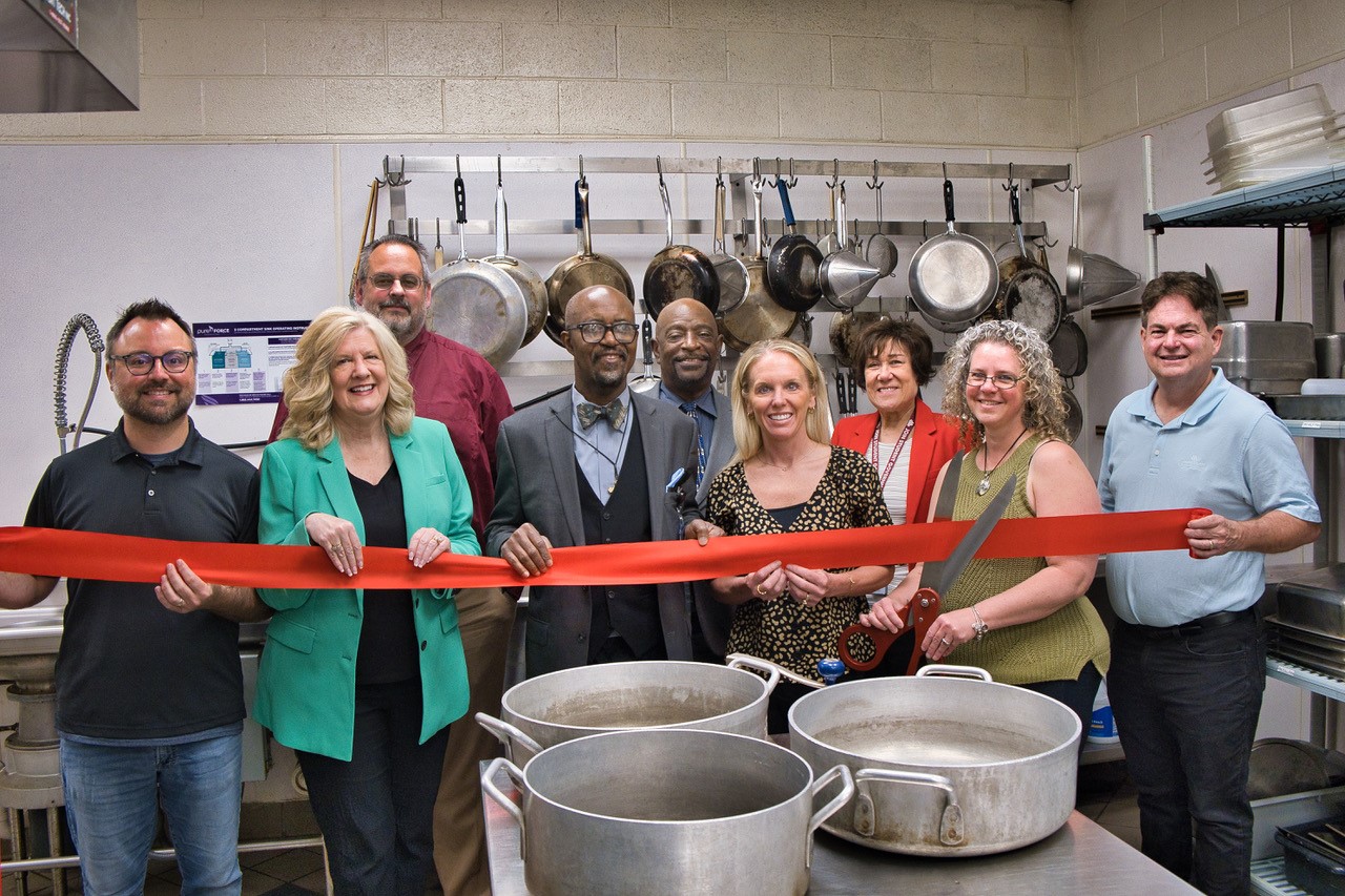 group photo ribbon cutting ymca mccc