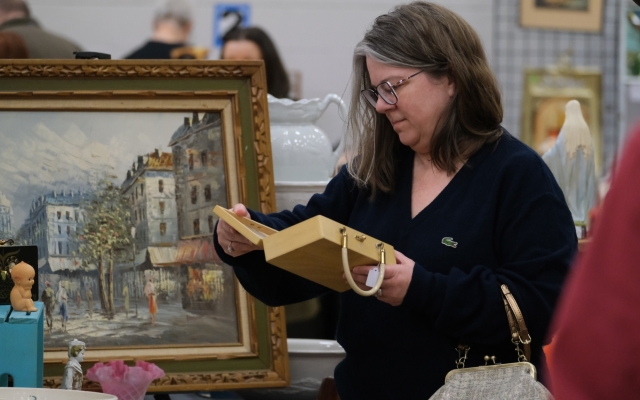 Female looking at a box 