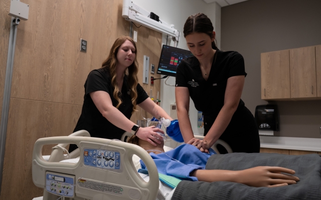 two nurses working in lab