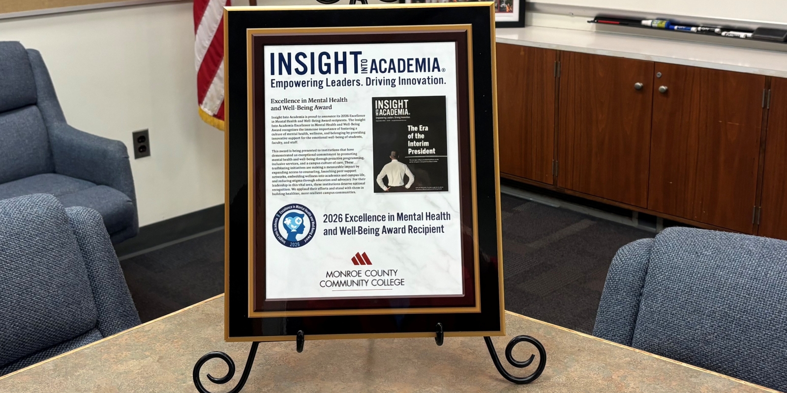Excellence in Mental Health and Well-Being Award displayed on table