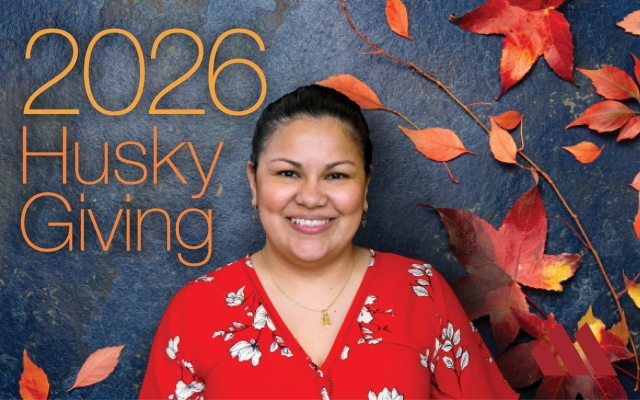 Woman smiling with "2026 Husky Giving"