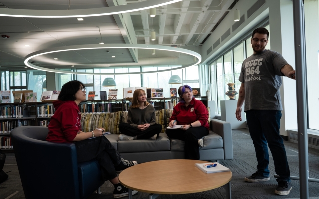 Group of Students in library working