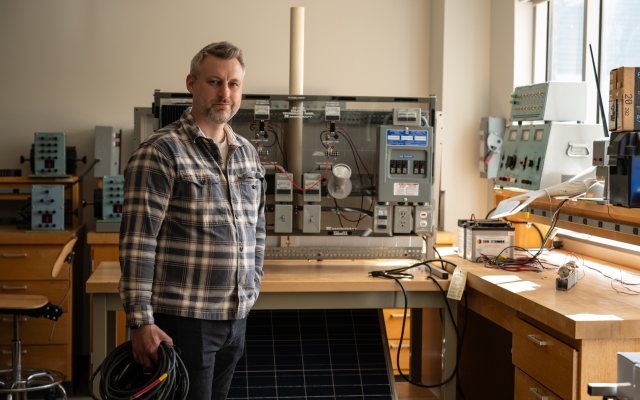 Worker in a electronics lab