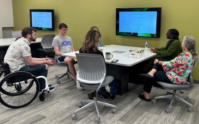 Students in a tutoring session.